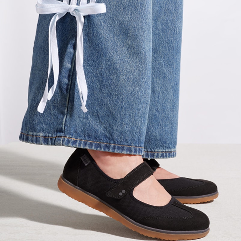 Model wearing black Ryka Effortless Mary Jane shoes