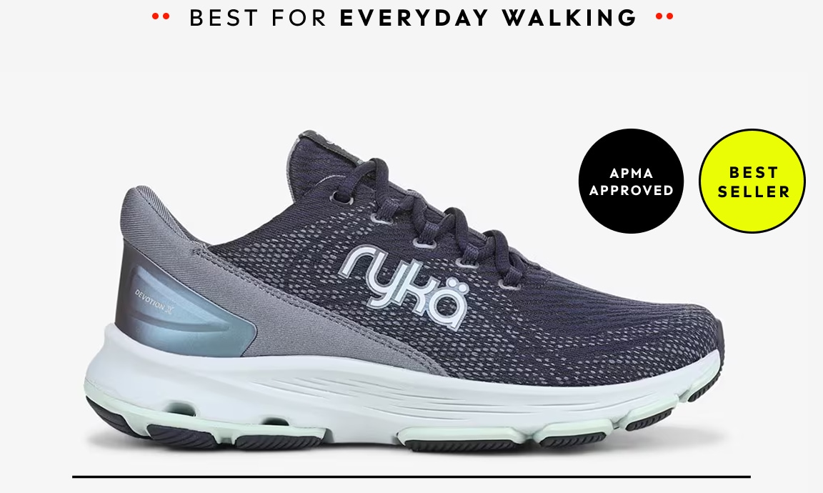 A side view of a navy blue women's walking sneaker. Text around the shoe reads 