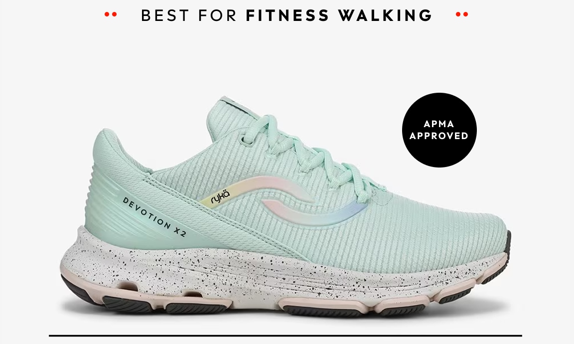 A side view of a mint green women's walking sneaker with a speckled sole. Text around the shoe reads 