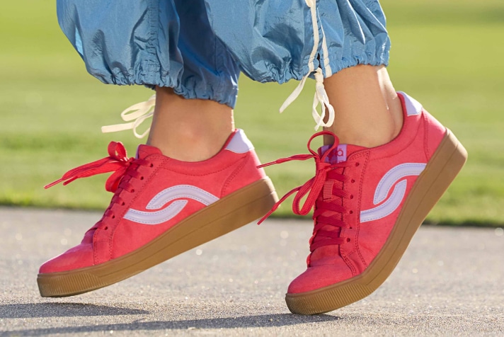 Model wearing red Rykä Viv Next shoes