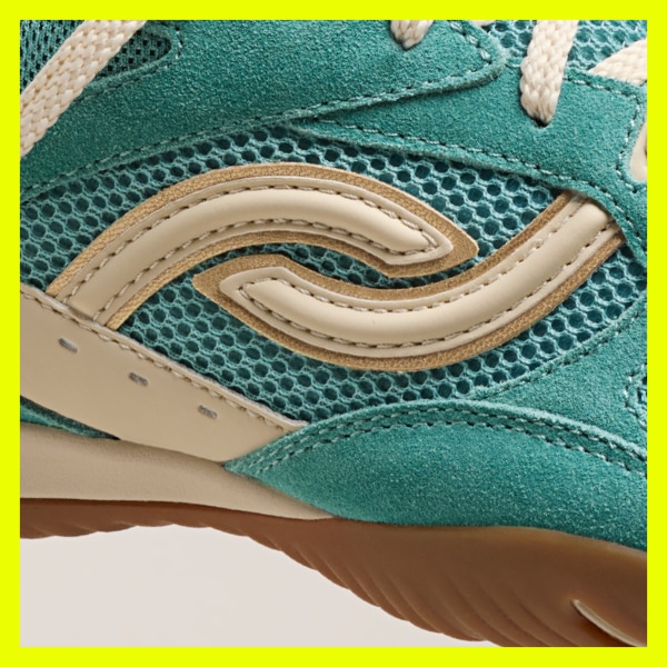 sideview of a Rykä Candor shoe featuring new logo plus breathable air mesh with suede overlays