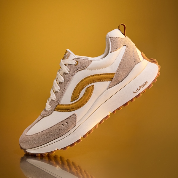 a yellow Rykä shoe on a yellow background