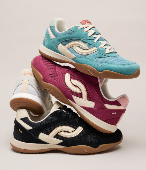 Image of several Rykä Low Profile Sneakers in various colors stacked on top of each other