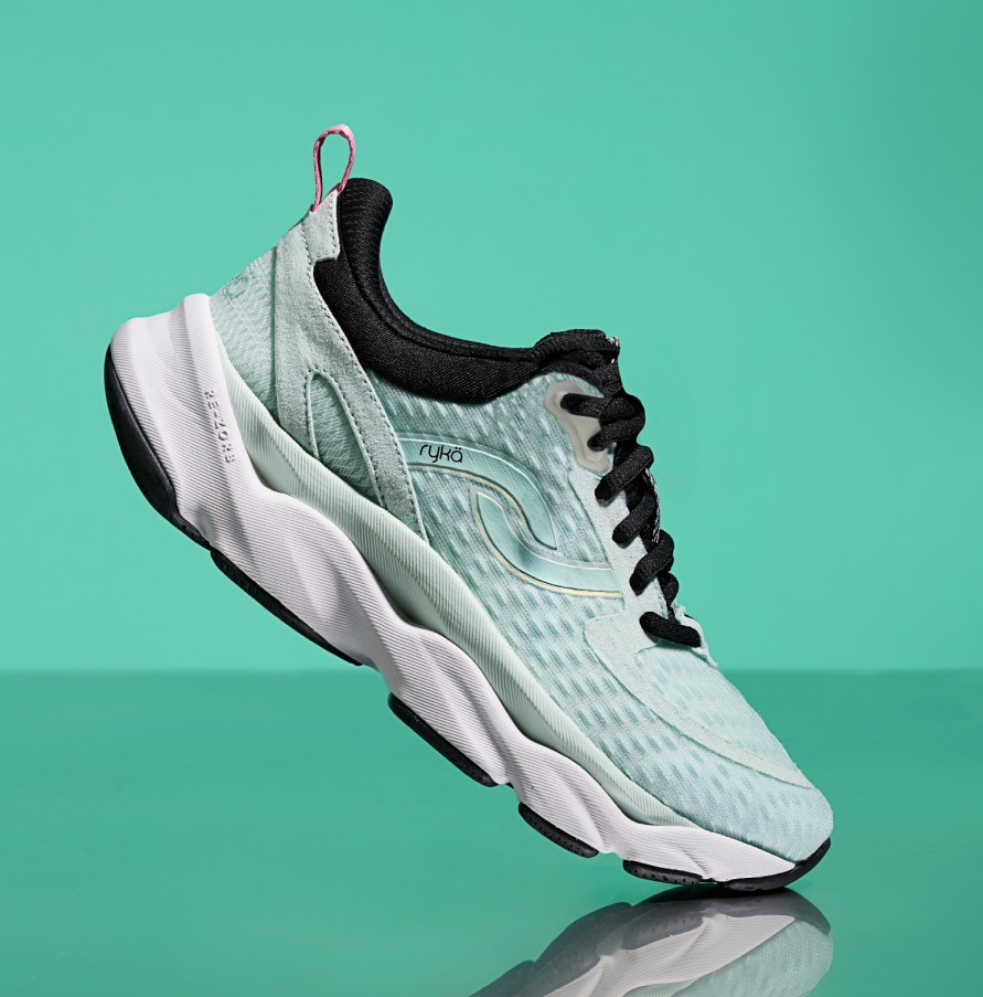 sideview of a Ryka mint green sneaker