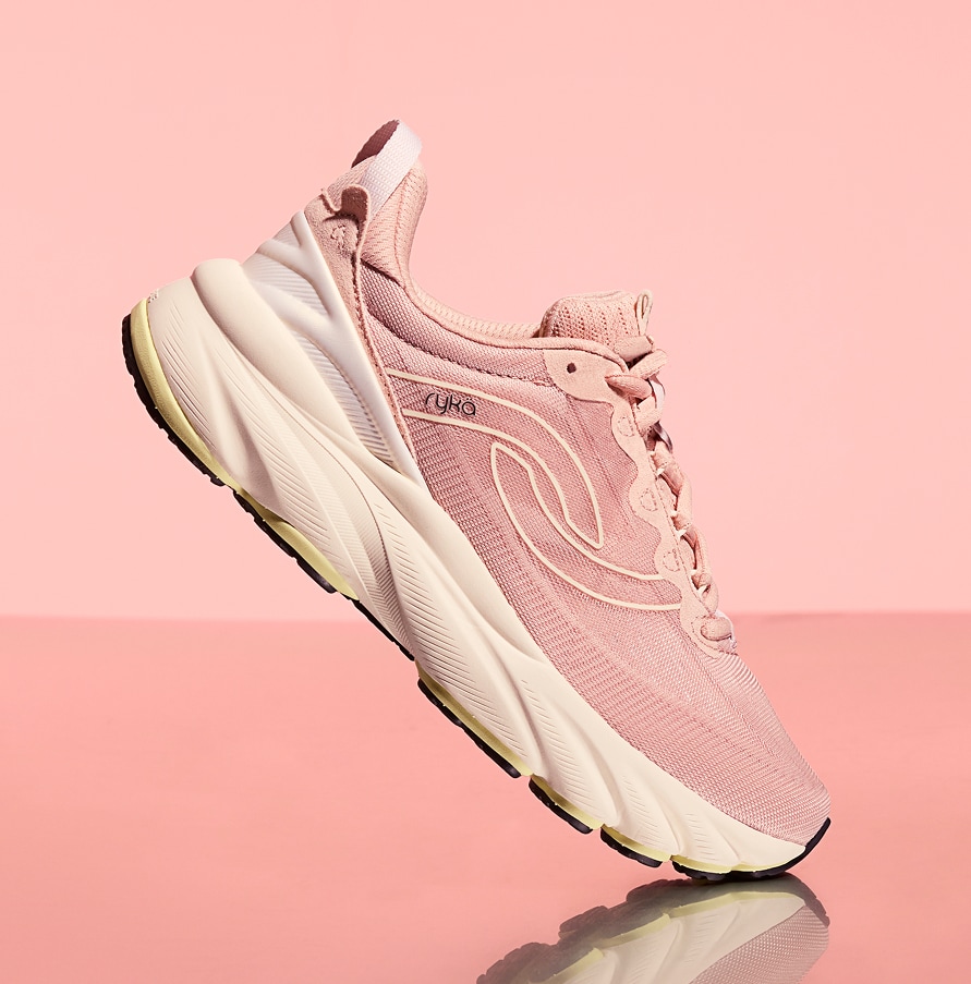 sideview of a Ryka blush pink sneaker