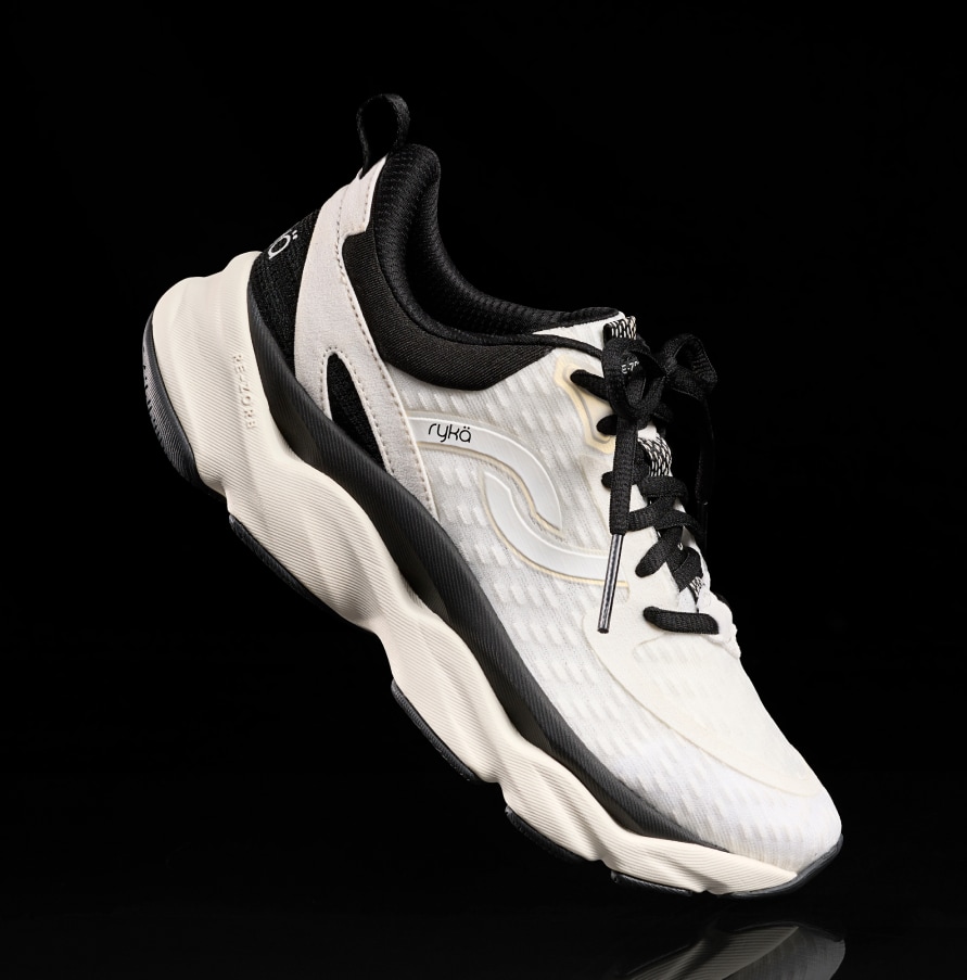 sideview of a Ryka Black and White sneaker