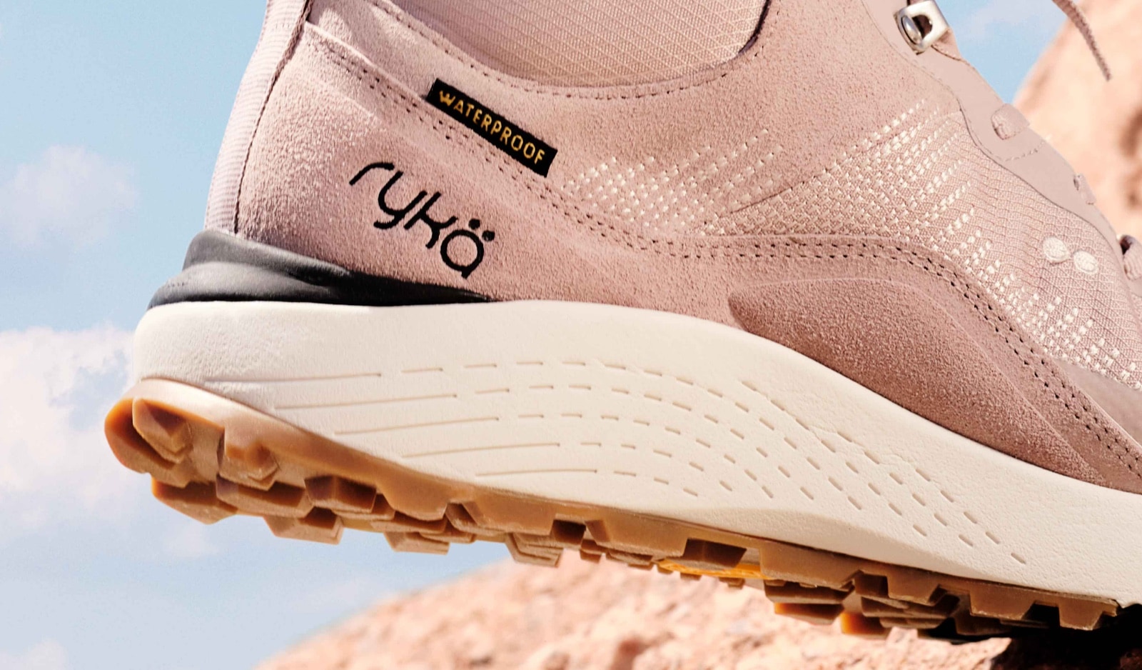 heel shot of a light pink Ryka shoe