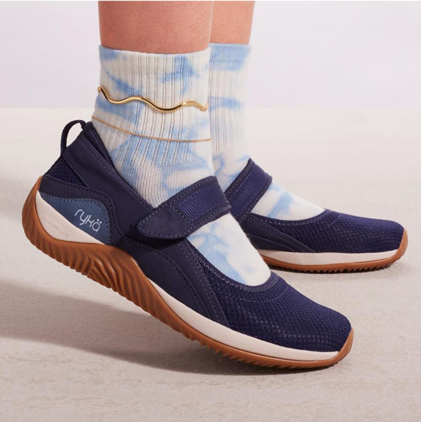 A model wearing a pair of Rykä Echo Knit Mary Jane shoes