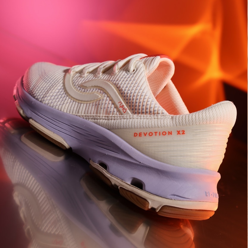 A Rykä Devotion X 2 shoe on a multicolor background